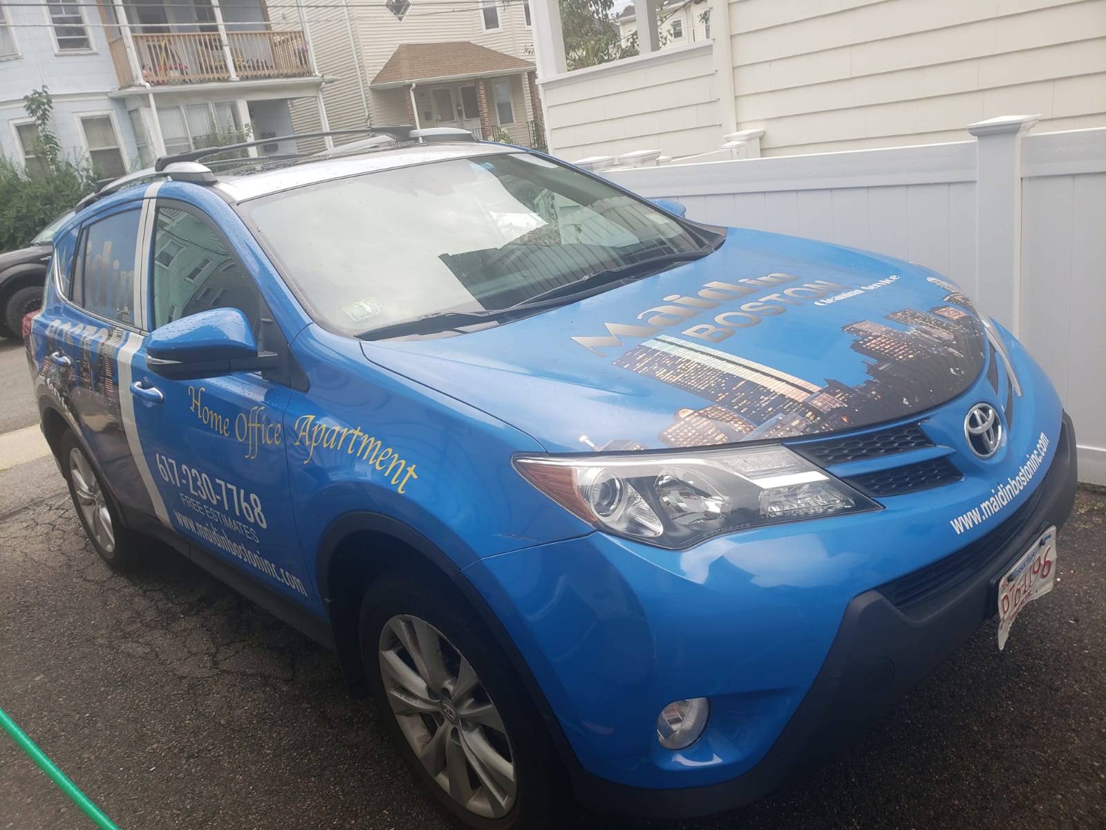 Maid In Boston's real wrapped service vehicle photographed in Medford